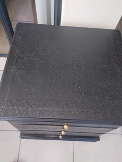 Embossed beside table