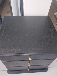 Embossed beside table