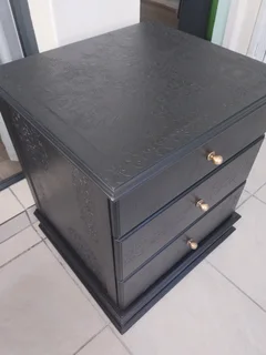 Embossed beside table