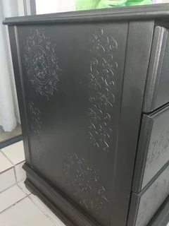 Embossed beside table