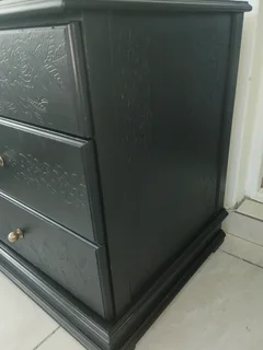 Embossed beside table