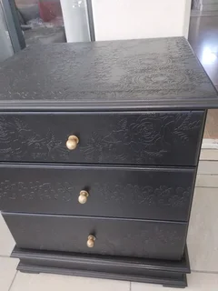 Embossed beside table