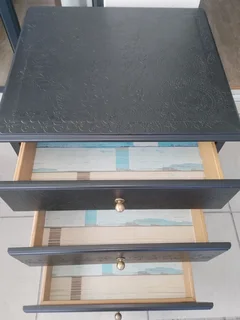 Embossed beside table