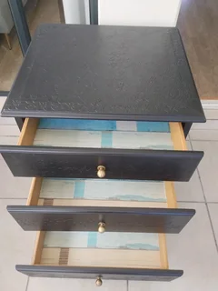 Embossed beside table