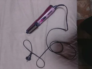 Hair straightener and hair dryer in one