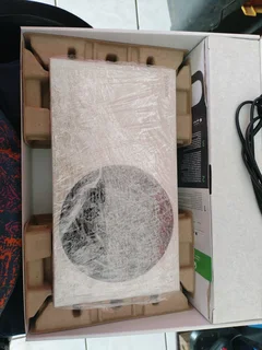 Xbox series s, plus original controller and packaging.