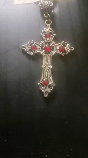 Cross necklace with red gemstones