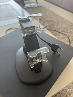 PlayStation 4 with controllers and charging station