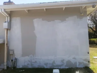 I'm looking Joker construction offending Roofing painting walls