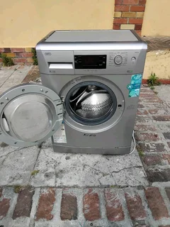 Silver Defy front loader washing machine with delivery