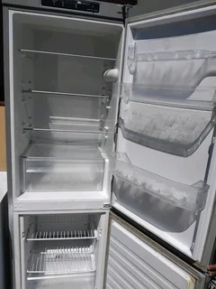 Metallic whirlpool fridge freezer with delivery