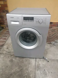 Silver Bosch front loader washing machine with delivery