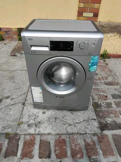 Silver defy front loader washing machine with delivery