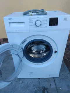 Defy front loader washing machine with delivery