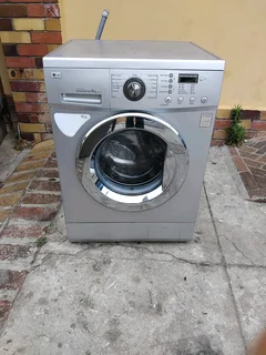 Silver LG direct drive 8kgs front loader washing machine with delivery