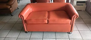 Two seater leather couches