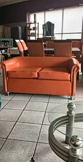 Two seater leather couches