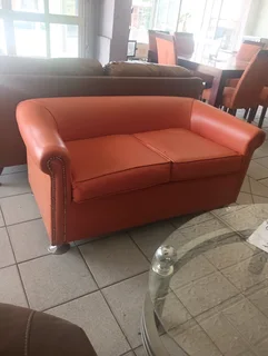 Two seater leather couches