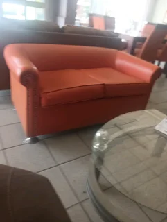 Two seater leather couches