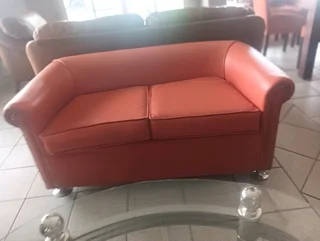 Two seater leather couches