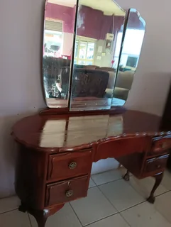 Imbuia wood dressing table with swivel gladed mirror and chair