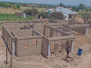 IAM contract  am doing building,plaster, tilling, roothing,paving selling, skimming and plastering