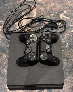 PS4 slim 1TB great condition
