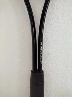 Wilson&#39;s squash racket, barely used, like new in pristine condition — price negotiable.