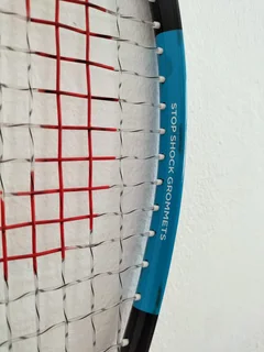 Wilson&#39;s squash racket, barely used, like new in pristine condition — price negotiable.