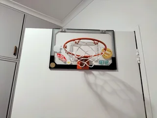 Indoor basketball hoop with ball and pump included, pristine like new condition