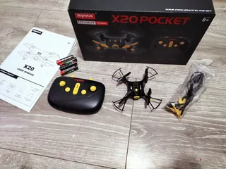 Mini drone, brand new like, pristine condition with batteries included