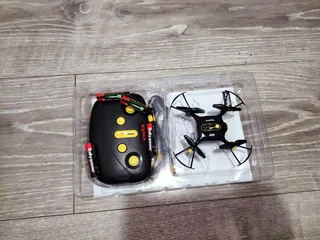 Mini drone, brand new like, pristine condition with batteries included