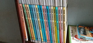 A set of Young Scientist books and a set of Juniir Encyclopedias