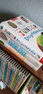 A set of Young Scientist books and a set of Juniir Encyclopedias