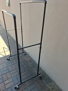 Clothing rail with wheels