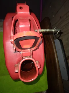 5 (five), litre Jerry can. Bright red metal can like new.
