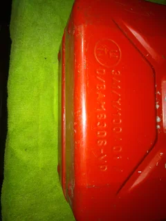 5 (five), litre Jerry can. Bright red metal can like new.