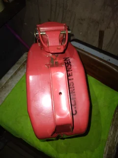 5 (five), litre Jerry can. Bright red metal can like new.
