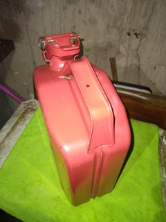 5 (five), litre Jerry can. Bright red metal can like new.