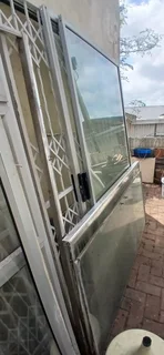 Burglar guards, gates and sliding doors and a trelidoor