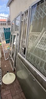 Burglar guards, gates and sliding doors and a trelidoor