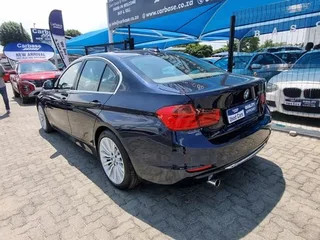 BMW 320i Luxury Line, Blue with 128000km, for sale!