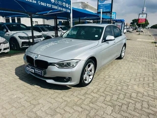 Silver BMW 320d with 98000km available now!