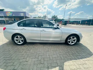 Silver BMW 320d with 98000km available now!