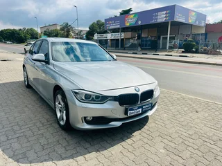 Silver BMW 320d with 98000km available now!
