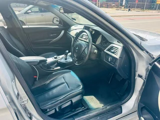 Silver BMW 320d with 98000km available now!