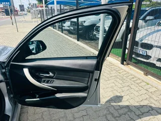 Silver BMW 320d with 98000km available now!