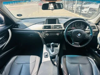 Silver BMW 320d with 98000km available now!