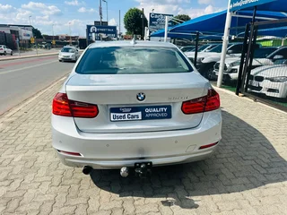 Silver BMW 320d with 98000km available now!