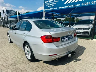 Silver BMW 320d with 98000km available now!